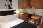 Bedroom and Kitchen, Cartwright Gardens Serviced Apartments, Euston