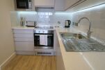 Kitchen, Quay Serviced Apartments in Manchester