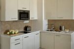 Kitchen, VISIONAPARTMENTS Warsaw Grzybowska
