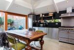 Kitchen and Dining Area, Margravine Gardens Serviced Accommodation, London