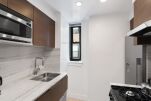 Kitchen. 400 East Apartments, Serviced Accommodation, New York