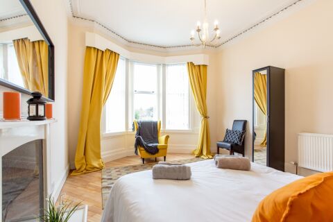 Downstairs bedroom with two single beds linked together to form kingsize bed