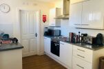 Fully kitted out kitchen with washer/dryer, oven and hob, fridge, freezer. Along with microwave, electric kettle, toaster and coffee machine with pods. 