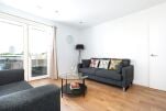 The living room area has two sofa beds which can each sleep two people