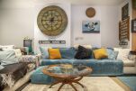 The lounge area has a large king size pull out sofa bed and an additional single bed to sleep up to 5 guests.