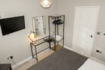 Bedroom, dressing and work space.