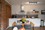 Spacious dining and kitchen area in our premium 2-bedroom apartment